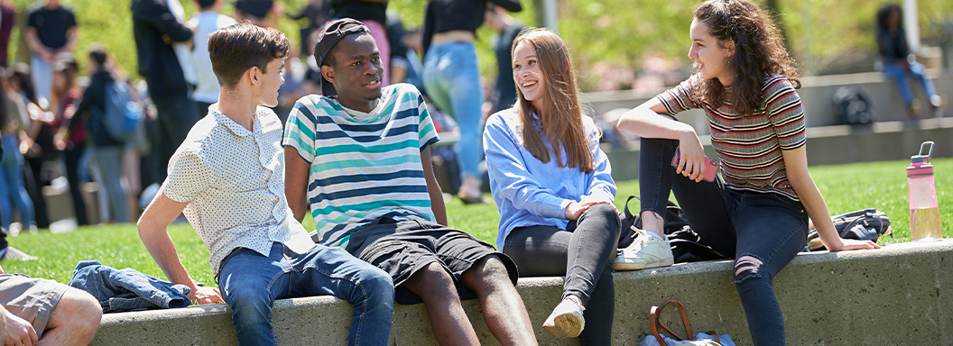 attend-interior-banner---stony-brook-students-on-wall